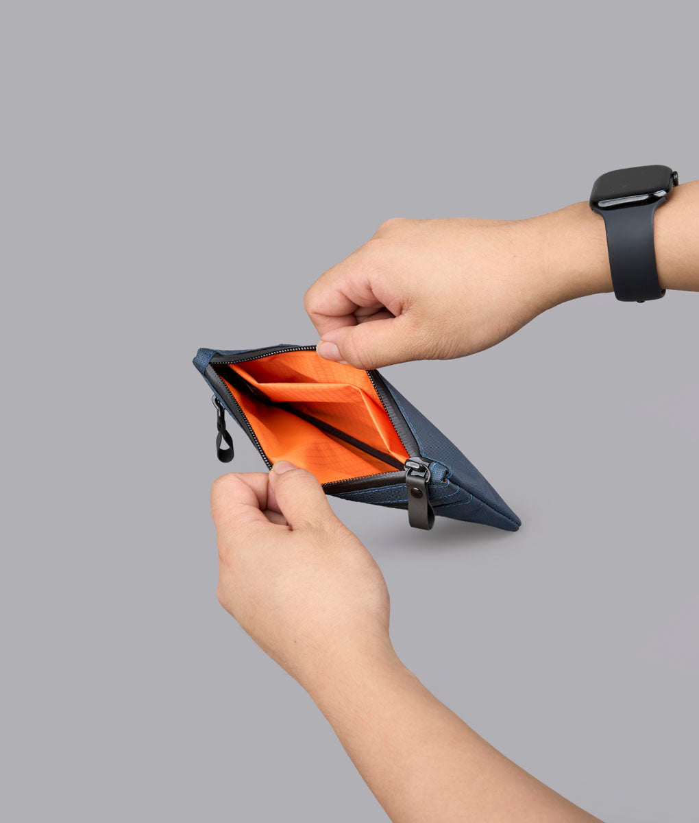 Alpaka Zip Clutch