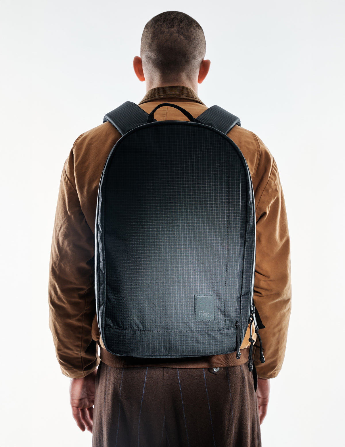 the-brown-buffalo-conceal-pack-21L-edc-laptop-bag-weather-resistant-everyday-use-challenge-ultra-black-grid1_edited.jpg