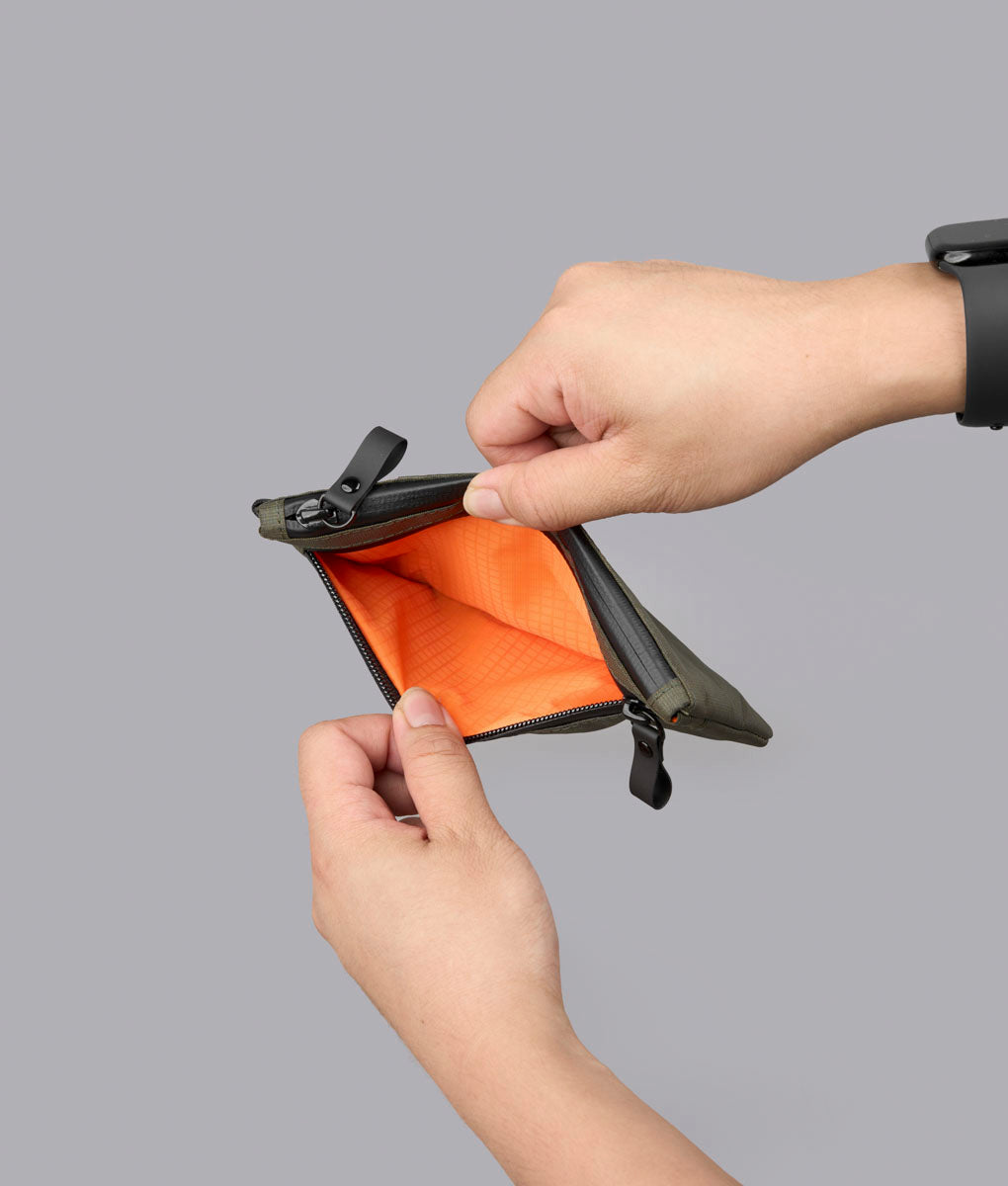Alpaka Zip Clutch