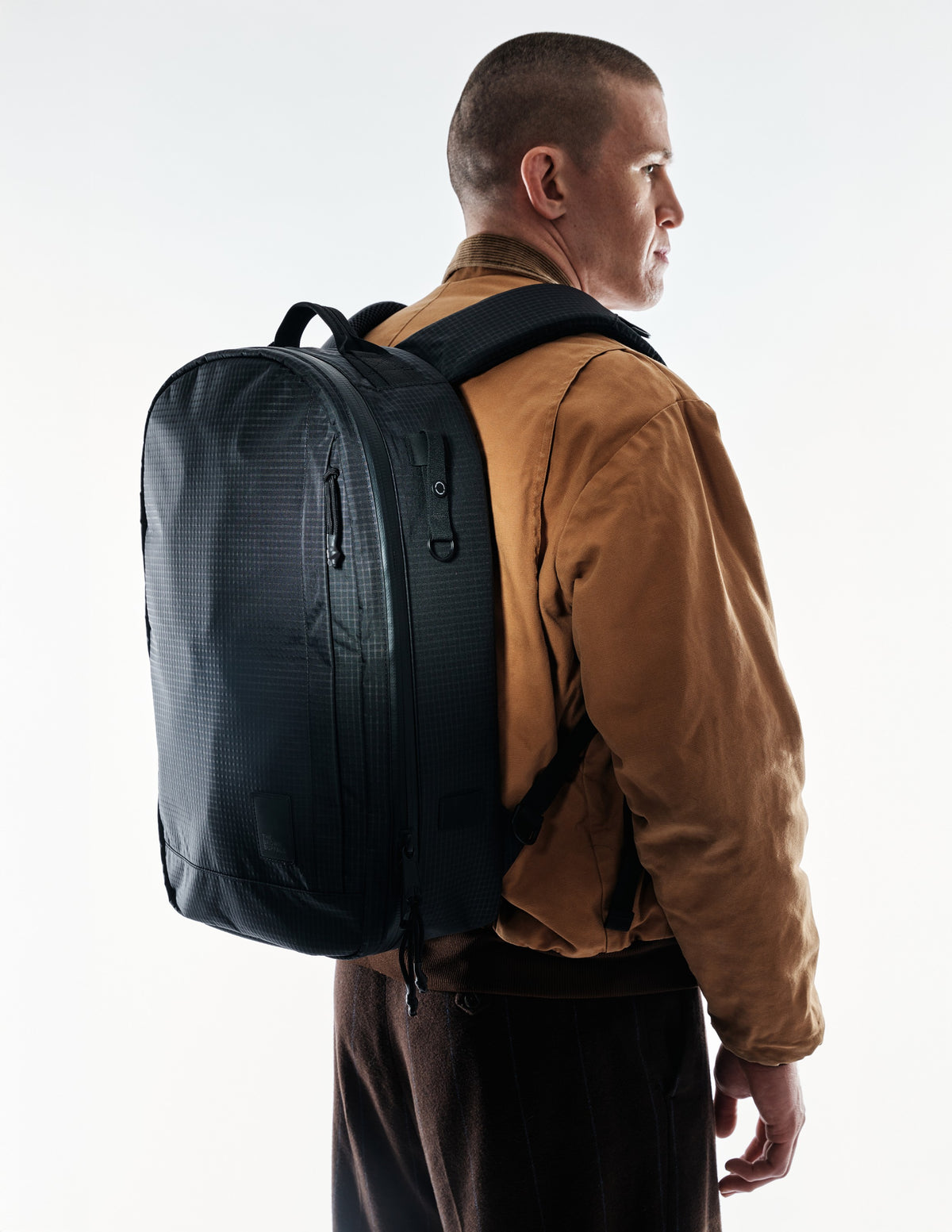 the-brown-buffalo-conceal-pack-21L-edc-laptop-bag-weather-resistant-everyday-use-challenge-ultra-black-grid_edited.jpg